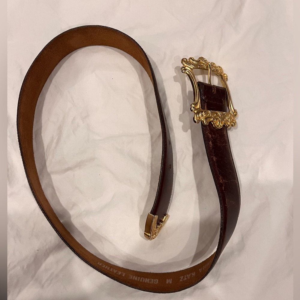 Vintage Donna Katz dark brown leather waist belt with brass accents